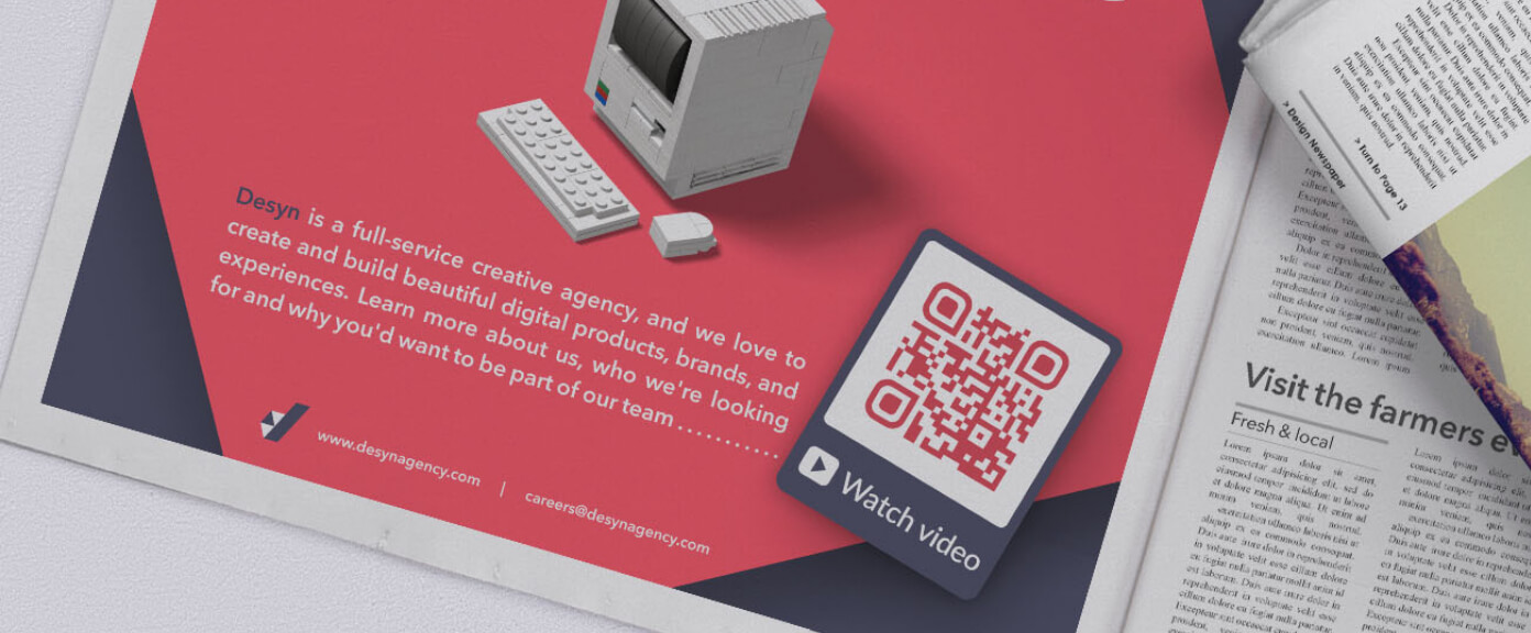Zeitschriftenanzeige einer Kreativagentur mit einem QR Code, der mehrere Videos in Form einer Playlist präsentiert.