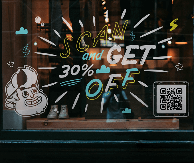 A clothing store window with a QR Code that offers a discount coupon when scanned.